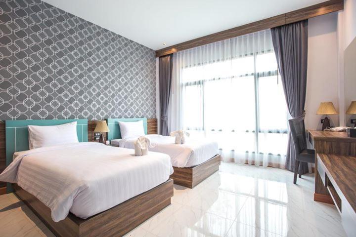 Eireann Boutique Hotel Prakhon Chai Bagian luar foto